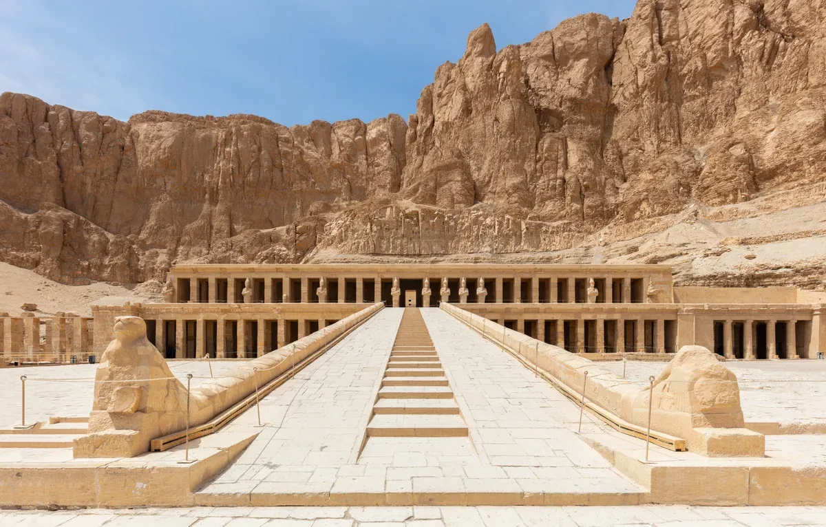 The terraces of the Temple of Hatshepsut at Deir el-Bahari under the cliffs of the West Bank, seen on a Valley of the Kings tour
